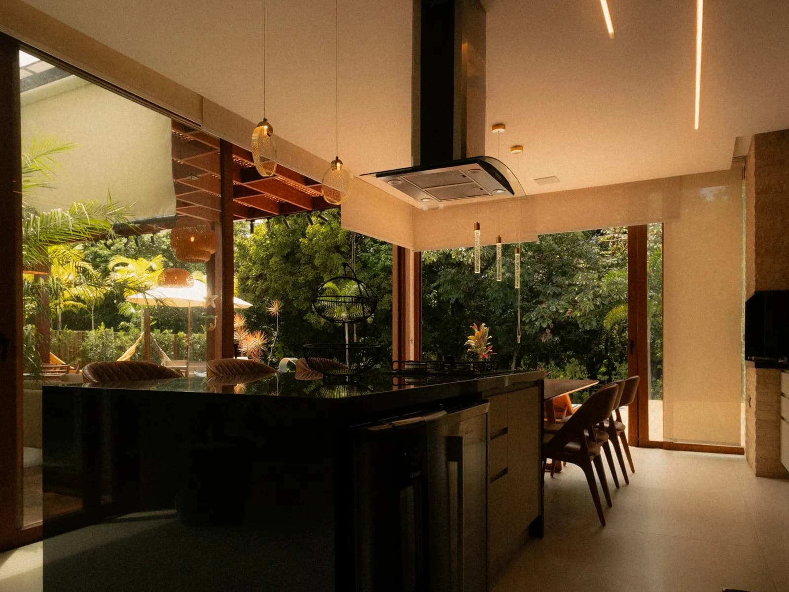 Kitchen lit with linear ceiling lighting